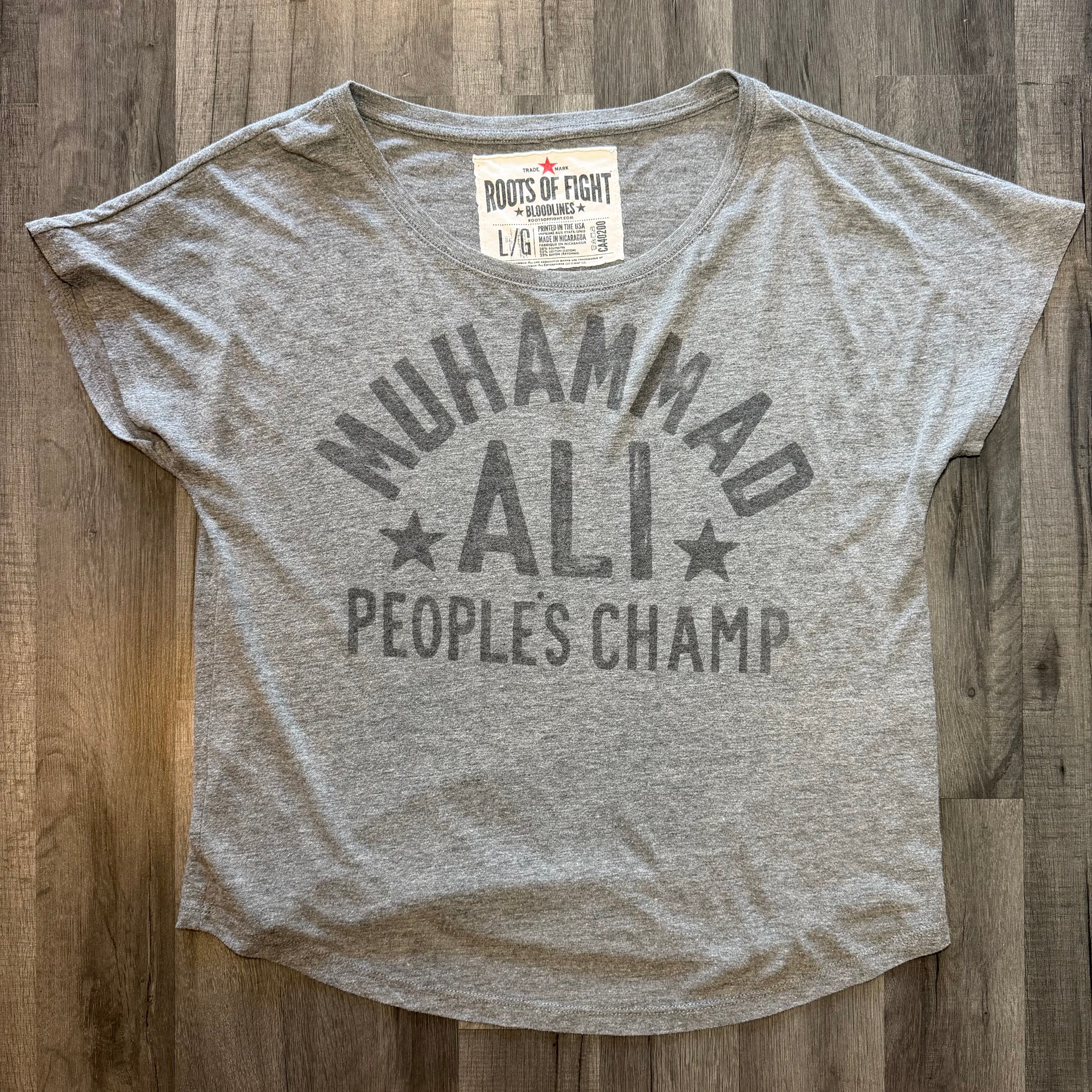 Roots of Fight Muhammad Ali Peoples Champ T-Shirt (Size Womens Large)