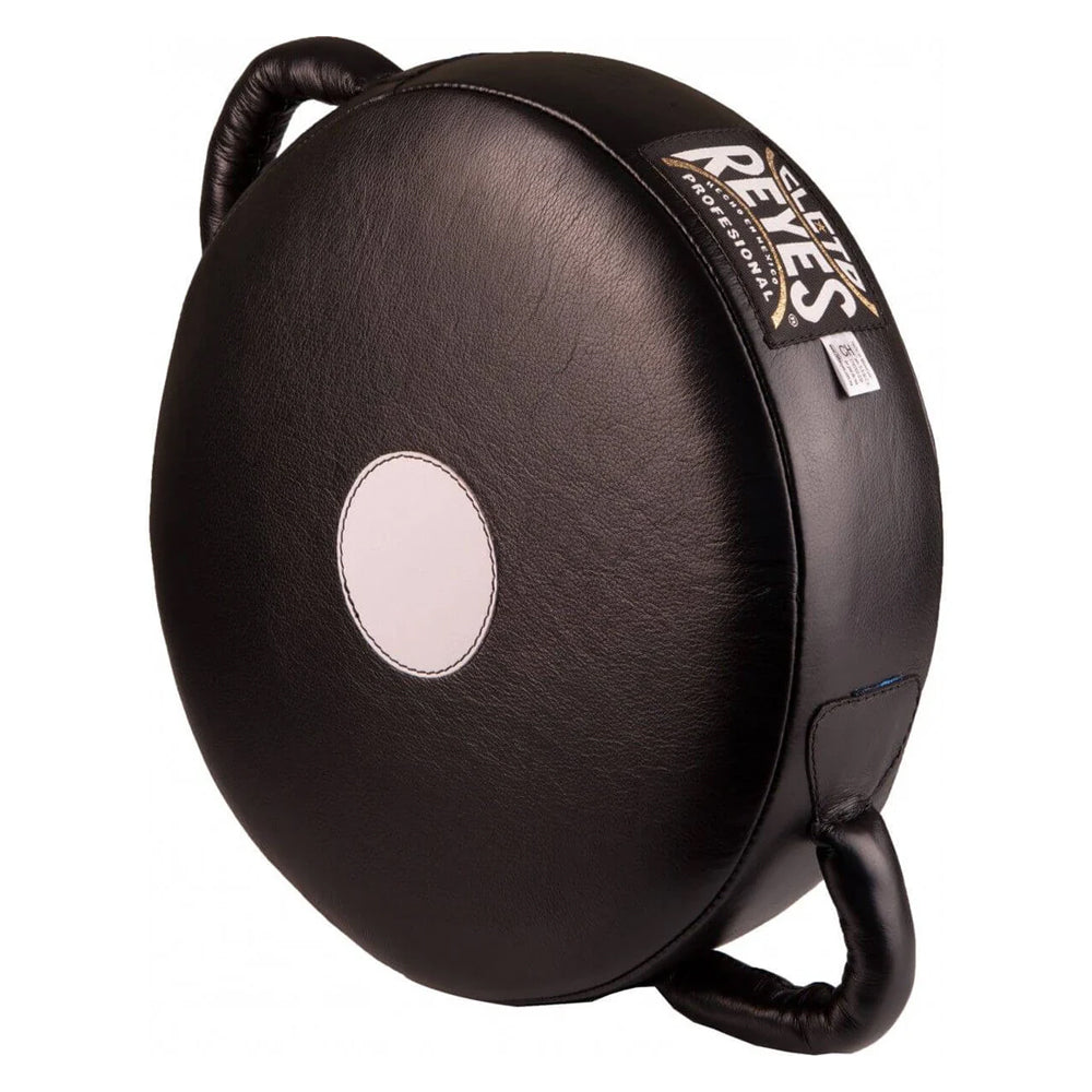 Cleto Reyes circle punch cushion black with white centre target spot and Cleto Reyes text logo in white and gold