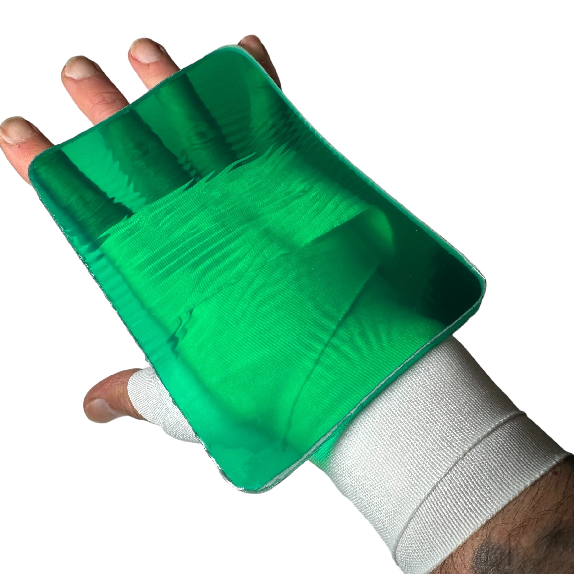 skull tec gel knuckle pads green on top of a hand wearing a handwrap