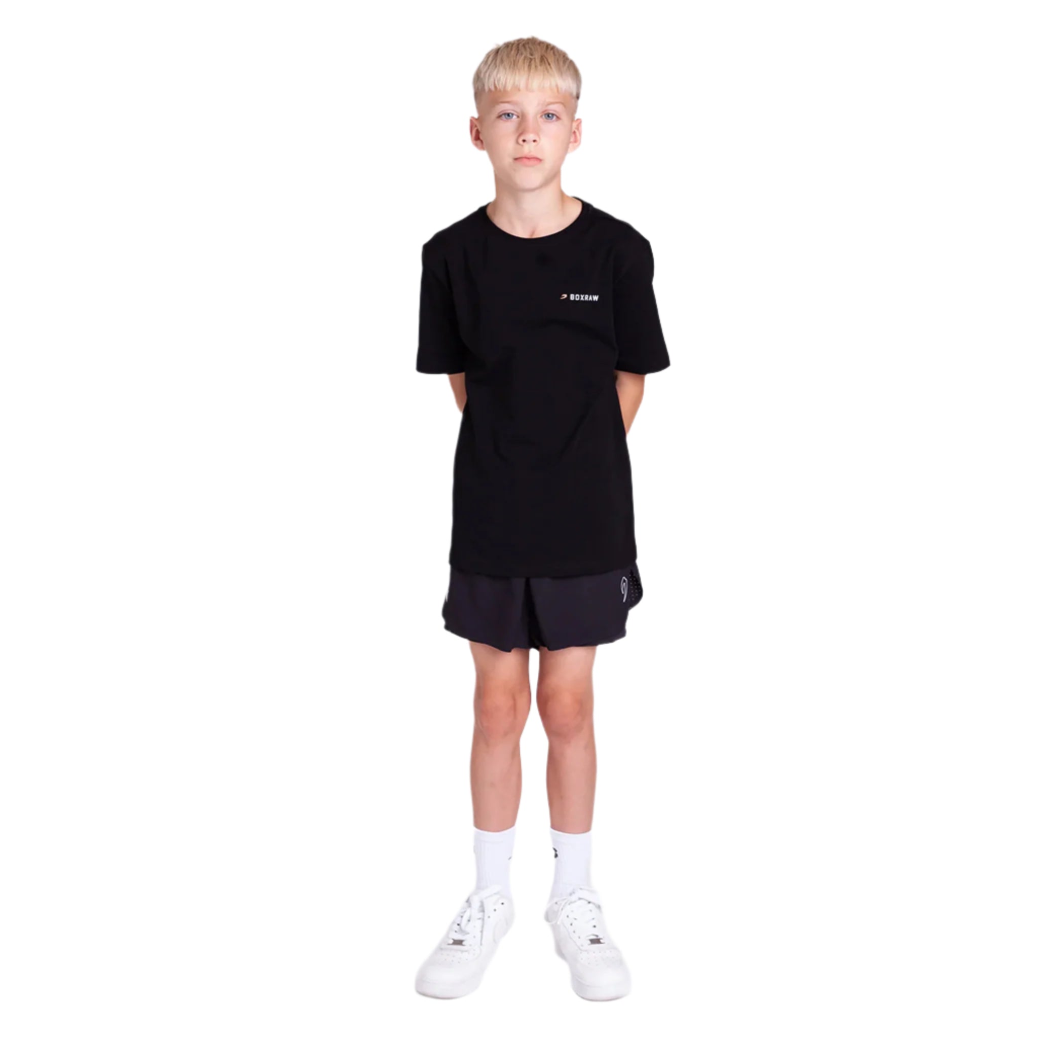 Child wearing a boxraw kids we dont play boxing t-shirt black with black shorts on a white background