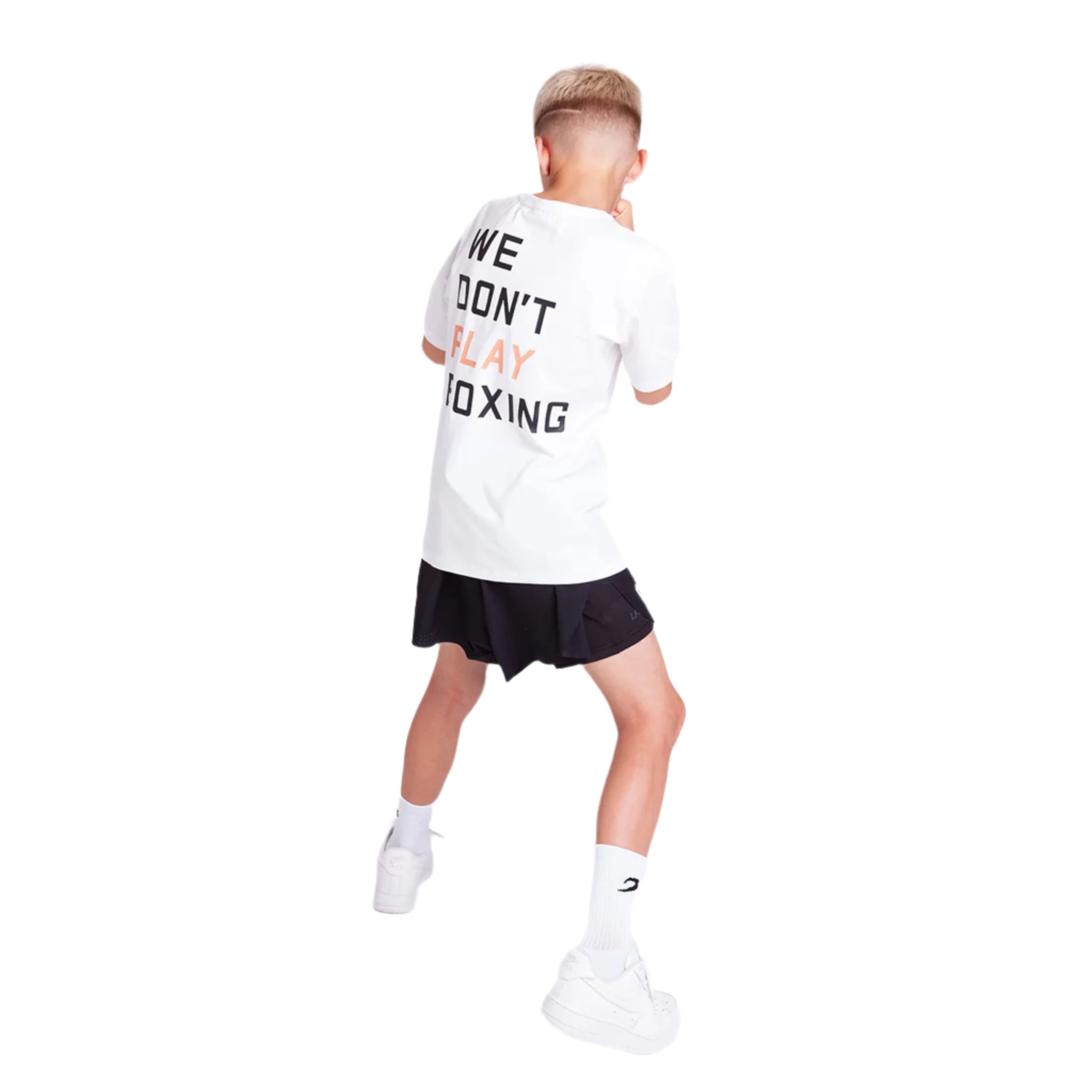 Child wearing a boxraw kids we dont play boxing t-shirt white with black shorts on a white background