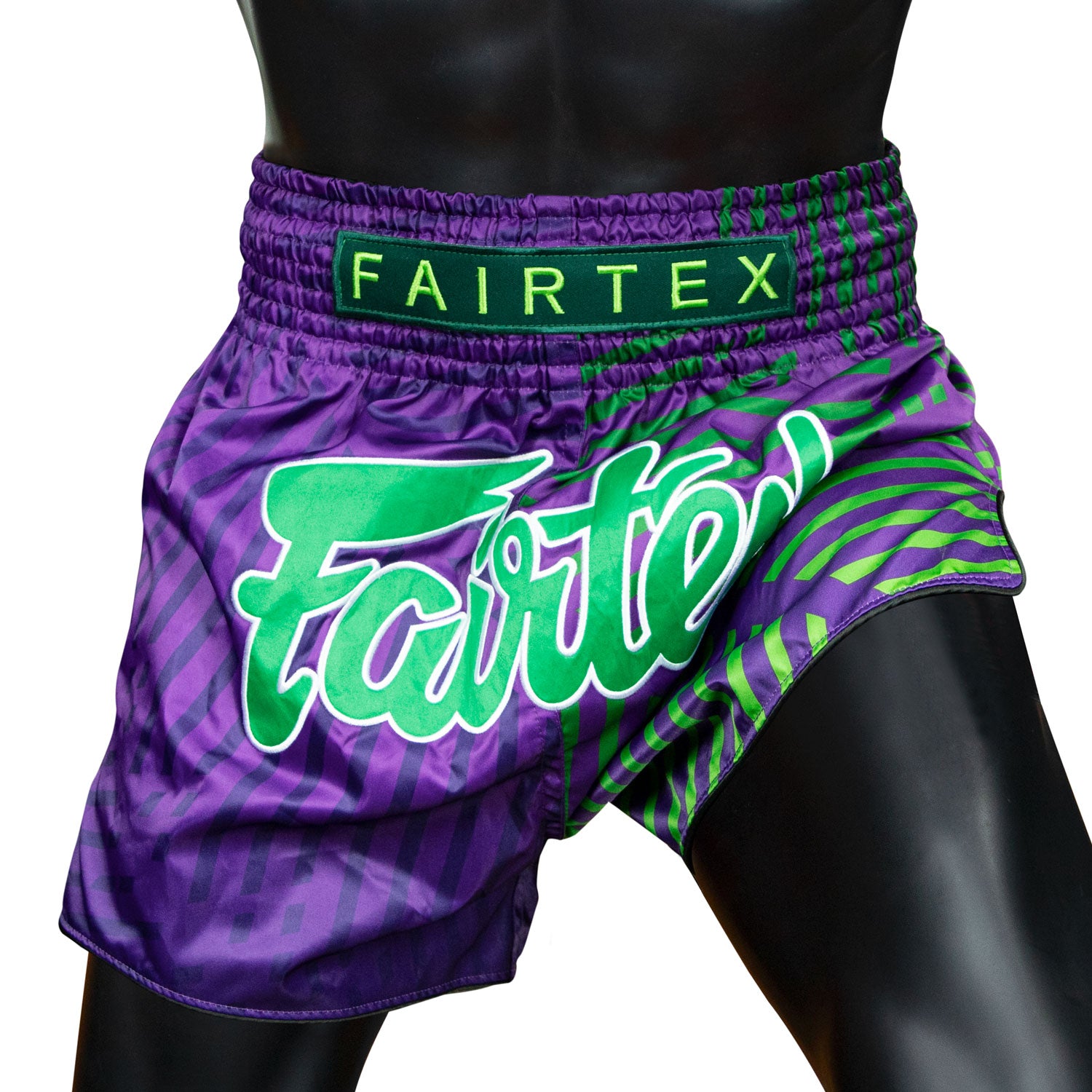 fairtex slim cut racer muay thai shorts purple with green stripes and green Fairtex logo