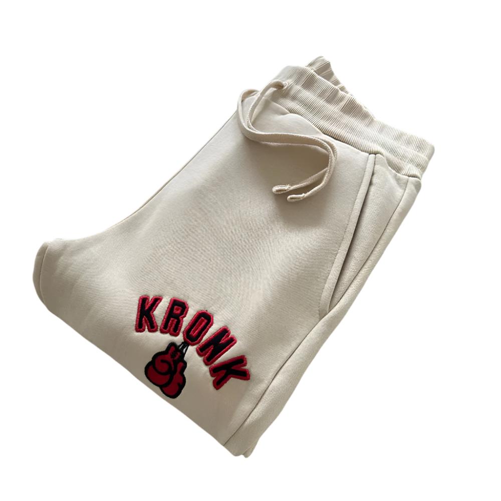 Kronk Gloves Applique Joggers Athletic Fit Off White with red and black kronk boxing gloves logo on left leg