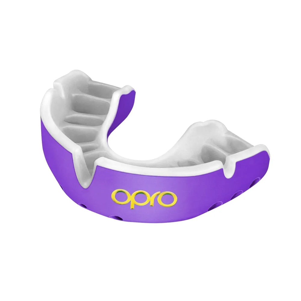 opro gold level mouthguard purple wiht gold opro logo and white inside section